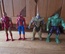 Hulk, Thanos, spiderman and iron man figures