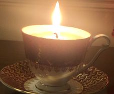 Vintage tea cup and saucer candle
