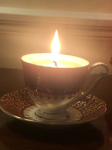 Vintage tea cup and saucer candle