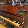 a circa-1931 Monington & Weston baby grand with matching stool. Image 4