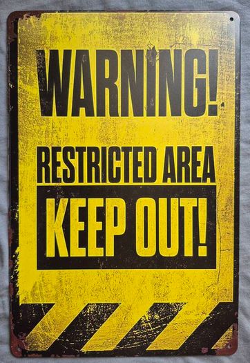 Warning, restricted area, keep out , vintage style metal sign .