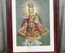 Antique Infant of Prague framed underglass c1940