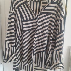 Larger ladies v neck waterfall blouse