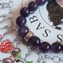 Thomas Sabo purple gemstone beaded charm carrier bracelet made with natural amethyst beads and an adjustable purple cord.Lovely condition Image 3