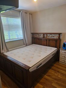 Bed. King size. Oak or cherrywood.  Antique.