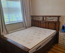 Bed. King size. Oak or cherrywood.  Antique.