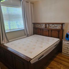 Bed. King size. Oak or cherrywood.  Antique.