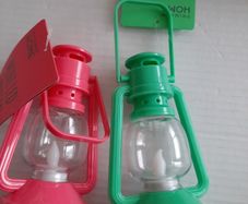2 small plastic garden lanters tags attached