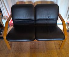 Black vintage 2-seater lounge seat
