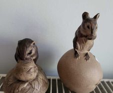 Two figurines of mice