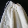 small cream fleece pullstring bag Image 2