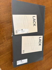 two IKEA black LACK shelves