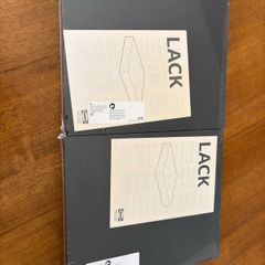 two IKEA black LACK shelves