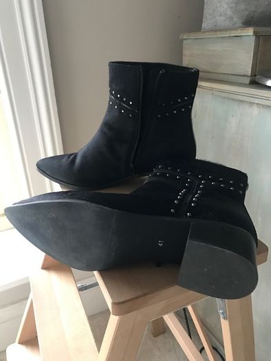 black leather Maruti ankle boots