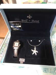 Ladies watch , necklace and earrings