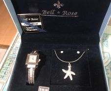 Ladies watch , necklace and earrings