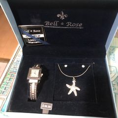 Ladies watch , necklace and earrings