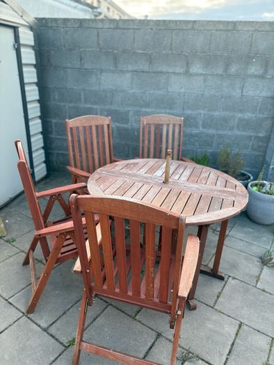 Hard wood garden table and chairs