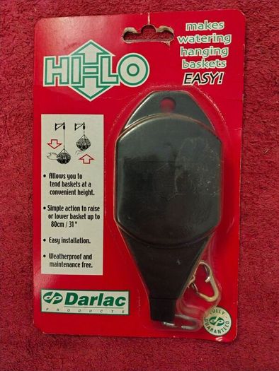 Device to raise and lower hanging basket for watering