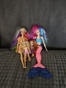 Barbie dolls and real mermaid