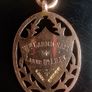 Rare antique (1926-27) 9ct rose gold school rugby shield pendant Image 4