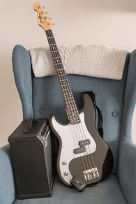 Left handed bass guitar with amp and accessories