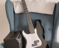 Left handed bass guitar with amp and accessories