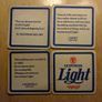 Guinness Light pint glass and beer mats Image 4