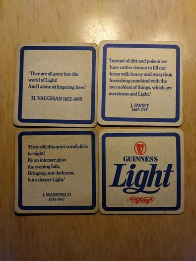 Guinness Light pint glass and beer mats