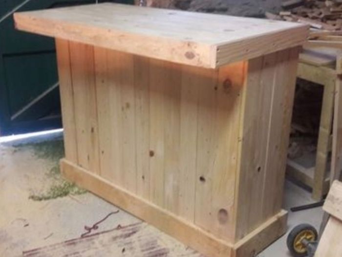Rustic kitchen island with overhang