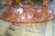 Pink Glass Art Deco Vanity Set, likely dating from the 1920s or 1930s. The set includes a Container, a Ring Holder, Two Candlesticks, and a Vanity Tray, Postage or Collection