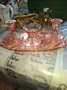 Pink Glass Art Deco Vanity Set, likely dating from the 1920s or 1930s. The set includes a Container, a Ring Holder, Two Candlesticks, and a Vanity Tray, Postage or Collection