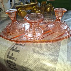 Pink Glass Art Deco Vanity Set, likely dating from the 1920s or 1930s. The set includes a Container, a Ring Holder, Two Candlesticks, and a Vanity Tray, Postage or Collection