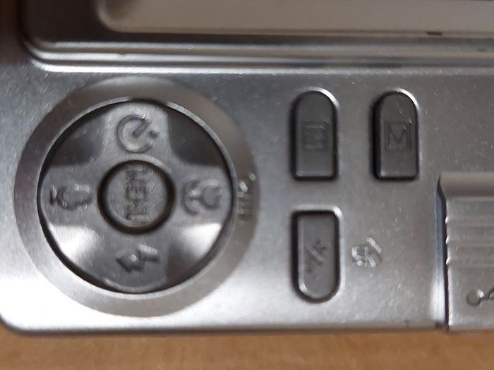 Z880 Digital Camera, Takes 2AA Batteries, working fine, has a modification that doesn't affect its performance