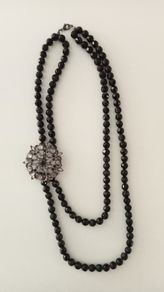 Black-Beaded Necklace with Broach Detail