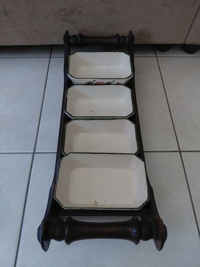 Vintage wooden serving tray with four ramekins