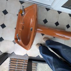 Funky  bathroom sink and taps