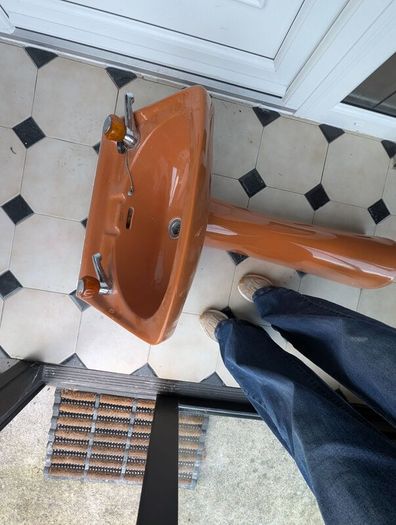 Funky  bathroom sink and taps