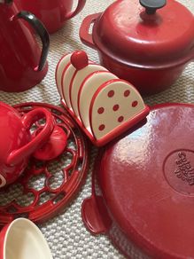 A bundle of Red Cooking Utensils- vintage enamel teapot, Pots, Pans . Cast Iron, Ceramic, Enamel etc