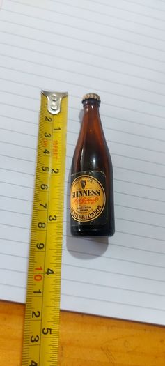 Vintage original Guinness miniature advertising bottle,with liquid inside some of of it must of evaporate,,hard to come by ,price includes free shipping within Ireland thank you, sold as seen, see pictures,,