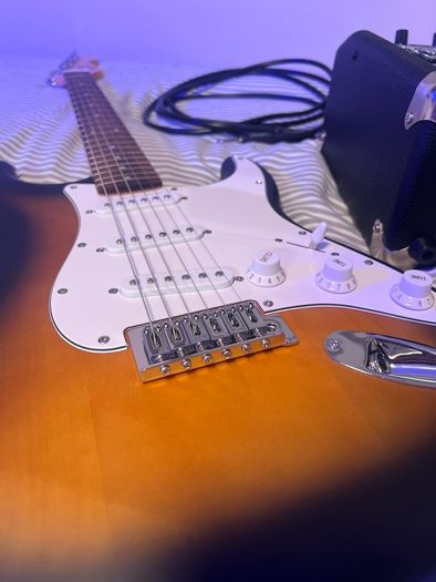 squire by fender debut Stratocaster in 2 tone sun burst with fender amp
