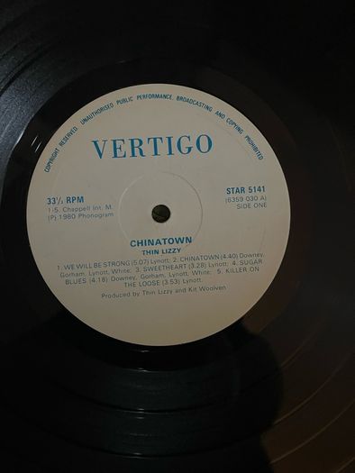 Very rare Thin Lizzy Zimbabwe release of Chinatown. A must for any Lizzy collector. So rare it's not found on Discogs. Vinyl is vg+. Sleeve is good. Zimbabwe sleeves were made with low grade re-cycled material so don't age well