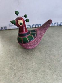 Decorative bird-like figure. Tonala pottery is named after the city of Tonala in Jalisco, Mexico