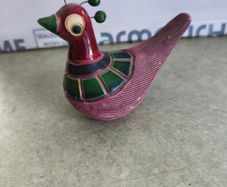 Decorative bird-like figure. Tonala pottery is named after the city of Tonala in Jalisco, Mexico