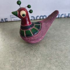Decorative bird-like figure. Tonala pottery is named after the city of Tonala in Jalisco, Mexico