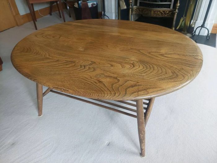 Vintage Ercol style oval coffee table with magazine rack