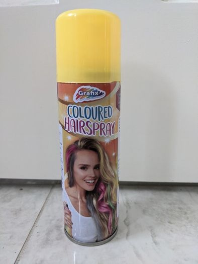 Yellow coloured hairspray