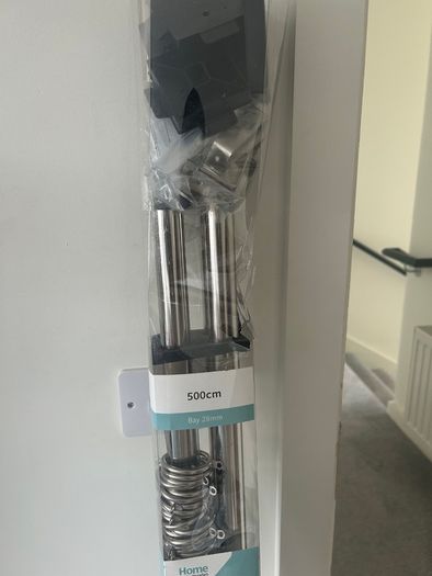 bay windows curtain poles