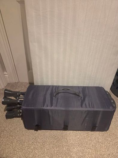 Travel cot with mattress and bag