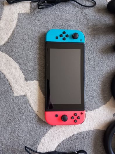 Nintendo Switch and accessories plus 2 games